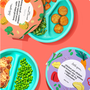 A group of Little Spoon plates including Broccoli Bites, Chicken Potstickers & Chicken Parm against a red background.